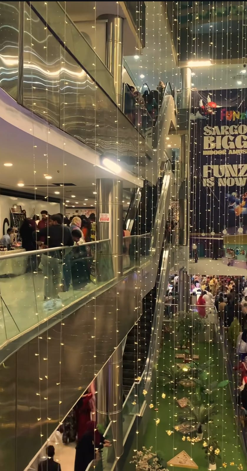 Decorated indoor venue for Summer Family Fest with vibrant lighting, colorful banners, and festive decorations creating an immersive and celebratory environment for attendees
