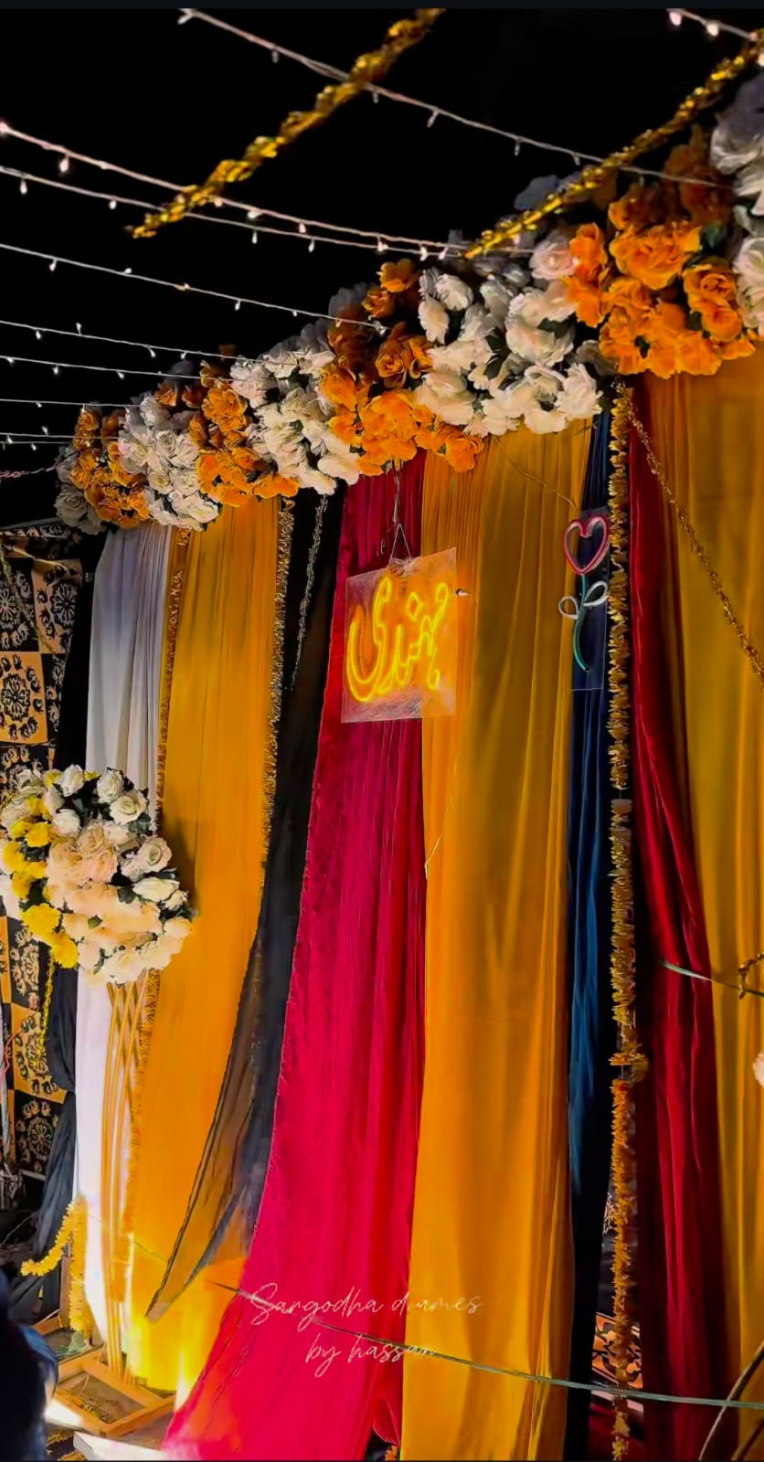 Detailed view of traditional aesthetic elements and gold leaf embellishments creating a sophisticated celebration environment
